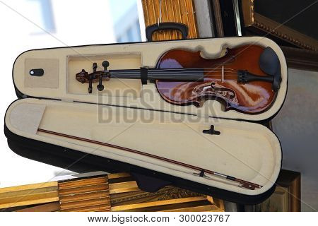 Small Violin And Fiddle In Open Case