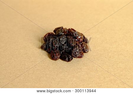 Dried Raisin On Brown Background, Black Raisin
