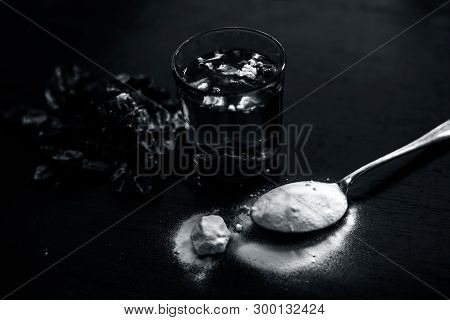 Popular Indian & Ayurvedic Tamarind Face Pack On Wooden Surface I.e. Tamarind Pulp Well Mixed With B