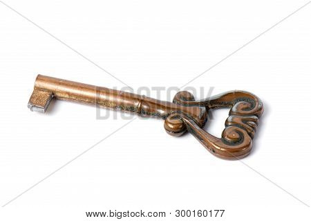 Old Key Isolated On White Background. Mysterious Old Key For Design. Antique Key With Rusty Metal. O
