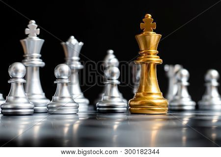 Gold King Chess Piece Face Another Silver Team On Black Background (concept For Leadership, Problem 