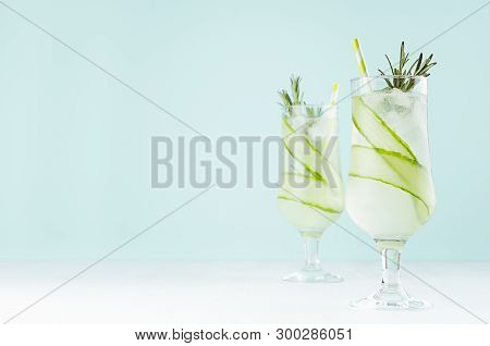 Fresh Cold Summer Muddy Cocktails With Ice Cubes, Cucumber, Rosemary, Lime, Straw In Elegant Modern 