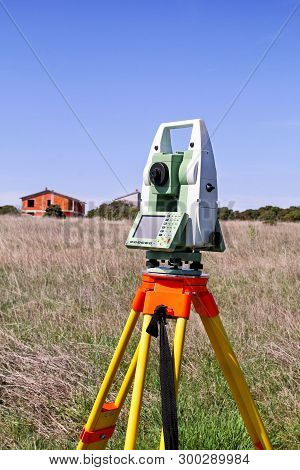 Total Station. Survey Instrument Geodetic Device. Fall Time Land Surveying, Total Station Set In The