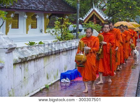 Luang Prabang , Laos - Aug 11 2018 : Buddhist Alms Giving Ceremony In Luang Prabang Laos On August 1