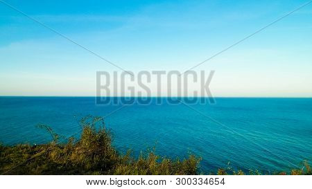 Baltic Sea From Cliff In Mechelinki, Poland. Nature And Travel Concept. Copy Space On Blue Sky.