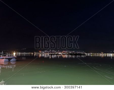 City Lights Reflection In The Water - Danube River - Orsova.