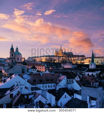 Roofs Of Prague And St. Vitus Cathedral In The Evening. This Image Is Toned.