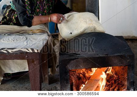 Close Up Of Old Arab Woman Hands Kneading Fresh Dough For Taboon Bread Or Lafah Is A Middle Eastern 