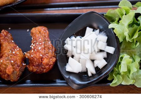 Spicy Korean Sauce Coated With Sesame On Fried Chicken Drumlets