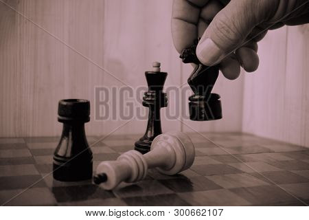 Playing Chess. Player Taking Right Action And Making Checkmate. Concept Of Running Company And Leadi
