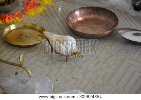 Close Up Of Some Puja Items Of Hindus Like Crong Shell On A Stand Made Of Brass, Brass Bowl, Copper 