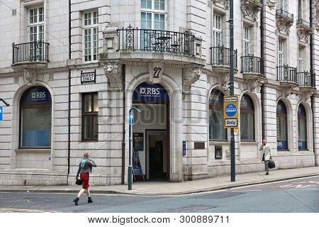 Leeds, Uk - July 12, 2016: People Walk By Rbs (royal Bank Of Scotland) In Leeds, Uk. Rbs Has 700 Bra