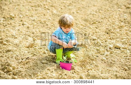 Natural Soil. New Technology In Farming. Earth Day. Summer Farm. Happy Child Gardener. Botanic Worke