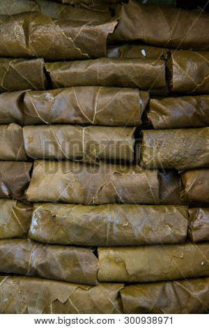 Dolma, Stuffed Grape Leaves With Rice And Meat. Top View. Delicious And Healthy Food. Grape Leaves. 