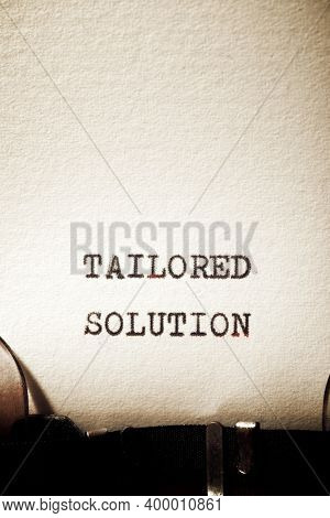 Tailored solution phrase written with a typewriter.