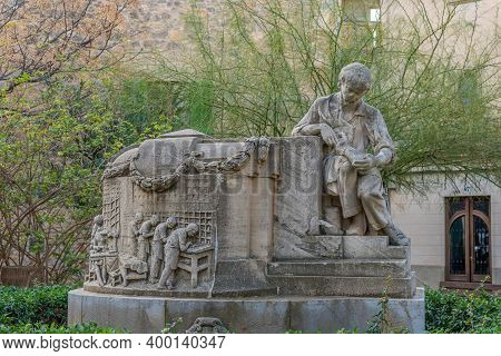 Llucmajor, Spain; December 17 2020: Sculpture In Homage To The Shoemaker's Guild, Made In Stone In A
