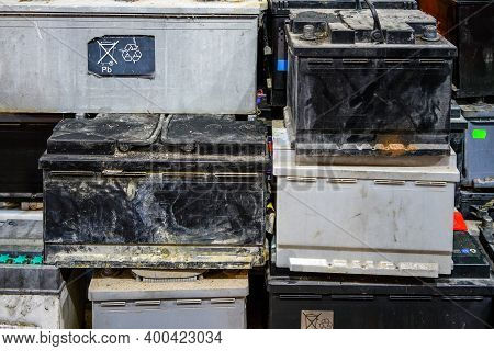 A Pallet With Used Car Batteries Awaiting Recycling At A Metal Recycling Scrap Yard