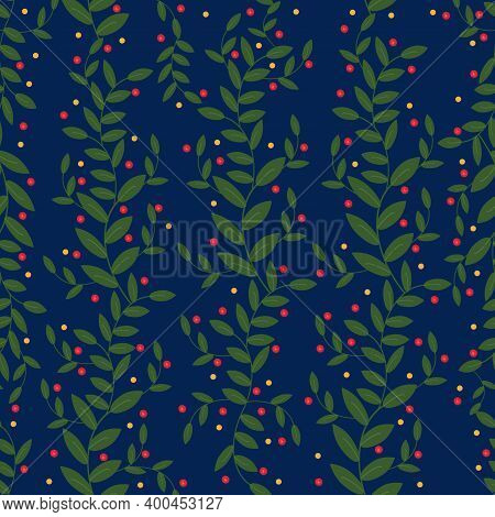 Branches Of Green Leaves With Red And Orange Berries On A Blue Background. New Year\'s Festive Compo
