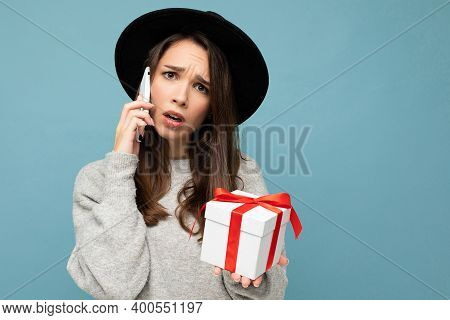 Shot Of Pretty Shocked Amazed Asking Young Brunette Woman Isolated Over Blue Background Wall Wearing