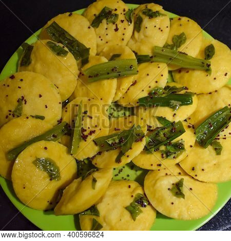 Dhokla Khaman Home Made With Coriander Garnishing On Plate, Fresh And Hot Yellowish Khaman Dhokla Wi