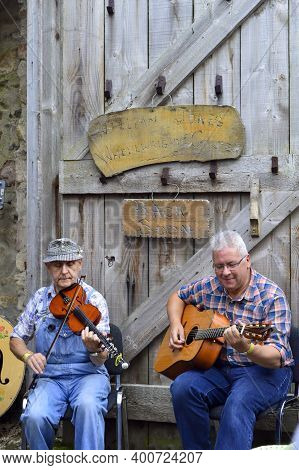 Omagh, County Tyrone, Northern Ireland, Sep., 2017. Two Men Perform Instruments In Ulster American F