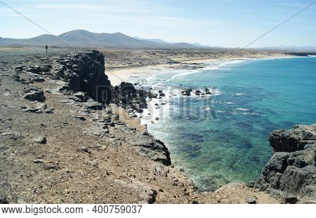 Dramatic Landscape, Fuerteventura Island Spain.  Beautiful Sea View Of A Sweeping Broad Beach At El 