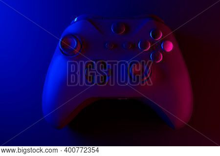 Realistic Video Game Controller In Neon Lights On Black Noir Background. 3d Rendering Of Streaming G