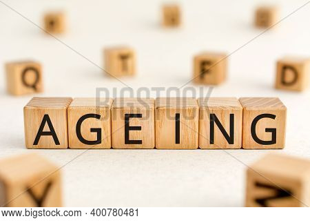 Ageing - Word From Wooden Blocks With Letters, Growing Old Senescence Ageing Concept, Random Letters