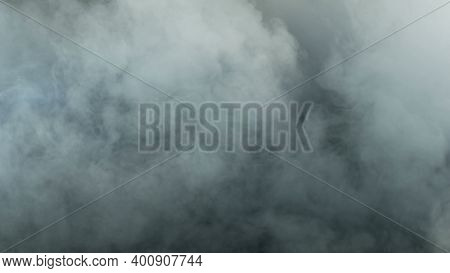 Photo Of Realistic Clouds, Smoke, Dry Ice Smoke Texture On Black Dark Background. For Website Backgr