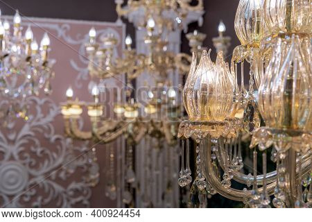 Plafond In The Form Of A Blossoming Flower Bud On A Crystal Chandelier With Pendants.