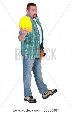 Man showing yellow helmet