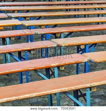 Hinged Benches Made Of Wood At The Floor