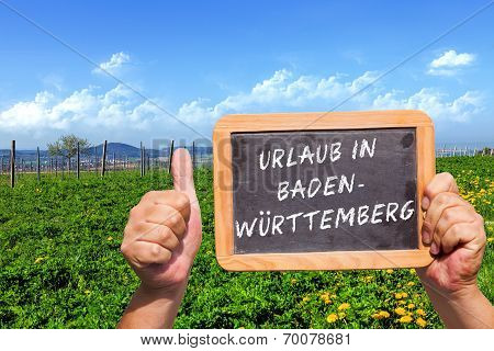 Human Hands Holding A Slate Blackboard With A Text Message