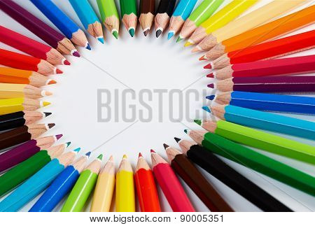 crayons stack circle on a white background