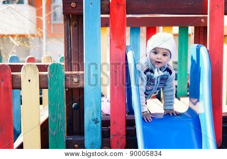Child at playground. Old Film-look