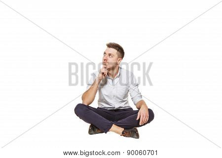 Man Sits And Thinks