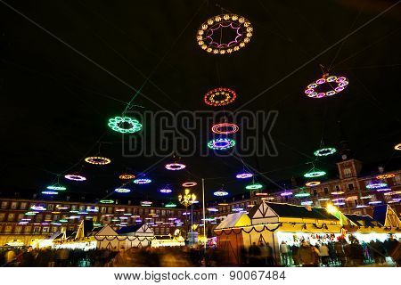 MADRID, SPAIN - DEC 23, 2011: christmas time at plaza de mayor in madrid in the night with illuminated stars