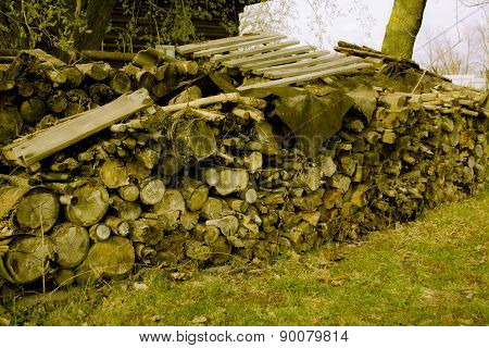 Stack of firewood in the Russian village