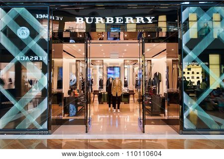 SINGAPORE - NOVEMBER 08, 2015: entrance to Burberry store. Burberry Group plc is a British luxury fashion house, distributing outerwear, fashion accessories, fragrances, sunglasses, and cosmetics