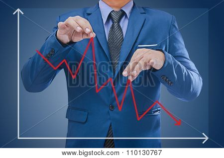 business man try to bring graph up business concept