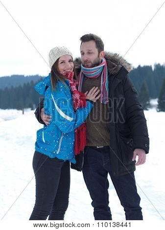 portrait of happy young romantic tourist  couple outdoor in nature at winter vacation