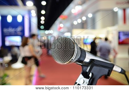 silver color of microphone with blurred event background
