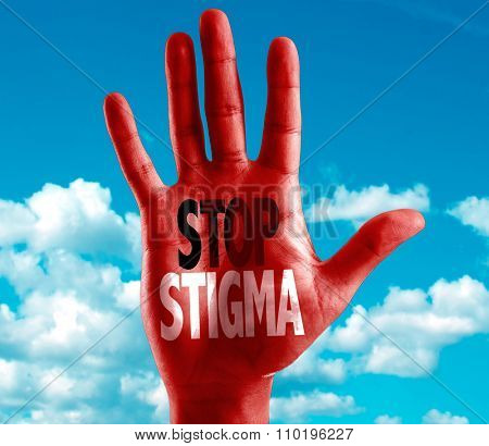 Stop Stigma written on hand with sky background