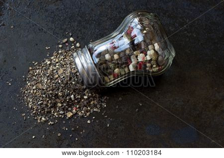 Pepper Mill With Crumbled Pepper Top View