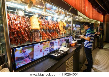 SINGAPORE - NOVEMBER 08, 2015: choice of prepared food in cafe at the food court of The Shoppes at Marina Bay Sands. The Shoppes at Marina Bay Sands is one of Singapore's largest luxury shopping malls