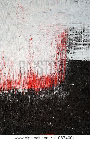 Brushstroke With White,black And Red Paint  On Dusty Metal