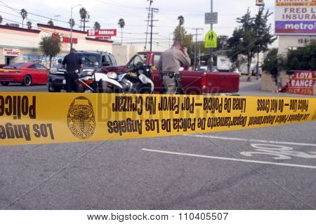 LONG BEACH, CALIFORNIA- DECEMBER 3, 2015: A High Speed Police Chase ends as the suspect car collides at an intersection with another car. Long Beach, California Dec. 3 2015