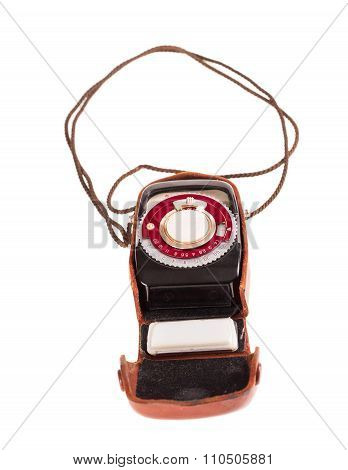 Old exposure meter in leather case.