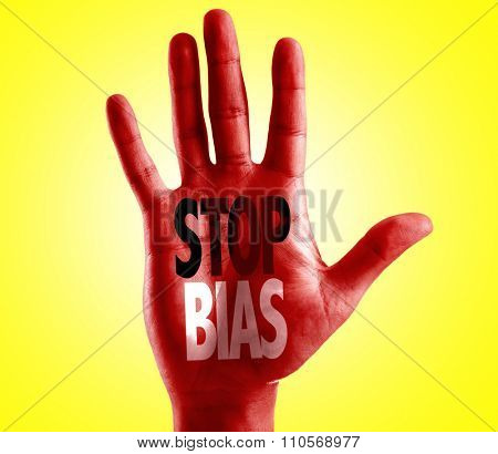 Stop Bias written on hand with yellow background