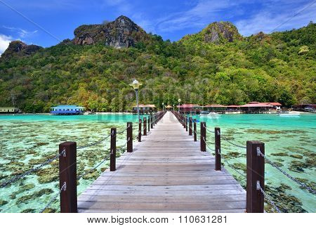 Long Wooden Pier Heading Toward Bohey Dulang Island In Sabah Borneo Malaysia.